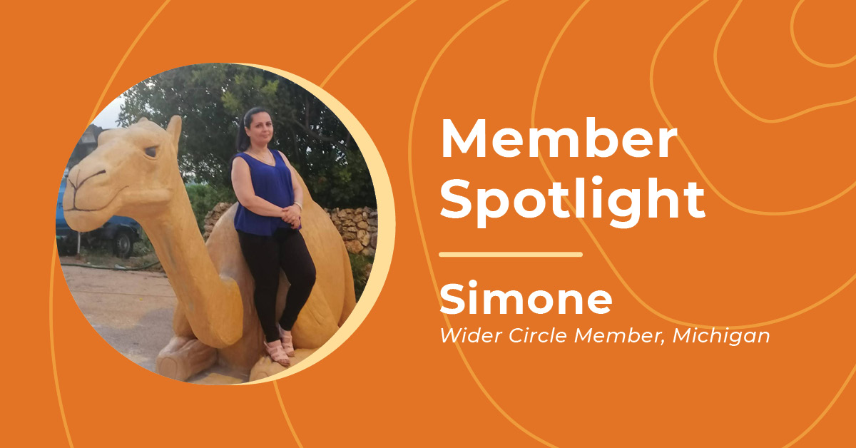 WiderCircle-MentalHealthMonth-blog-social-v2-Web-Blog (1) Female Wider Circle member Simone standing against a camel statue at a park smiling thoughtfully at the camera